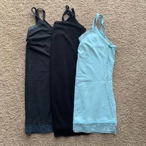 Bundle of lace edge tanks from Buckle